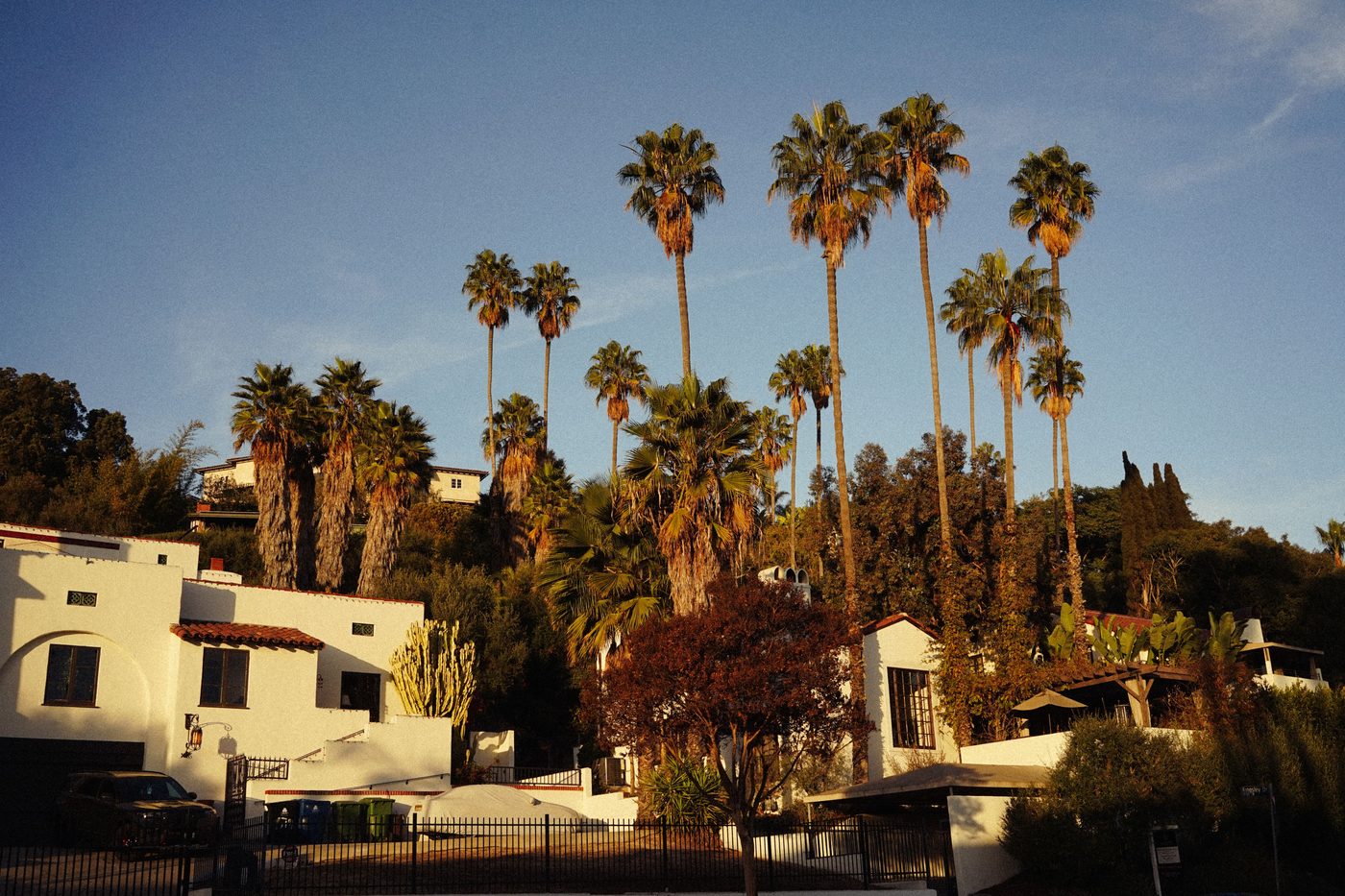 Spanish-style Southern California homes in warm evening light