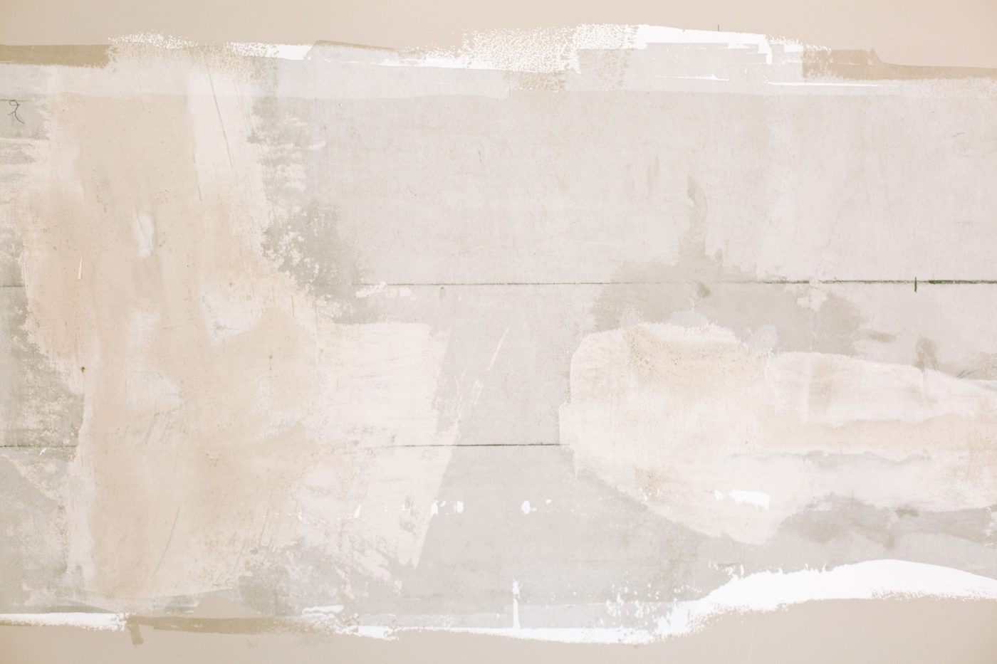 Neutral close view of an unfinished plaster wall