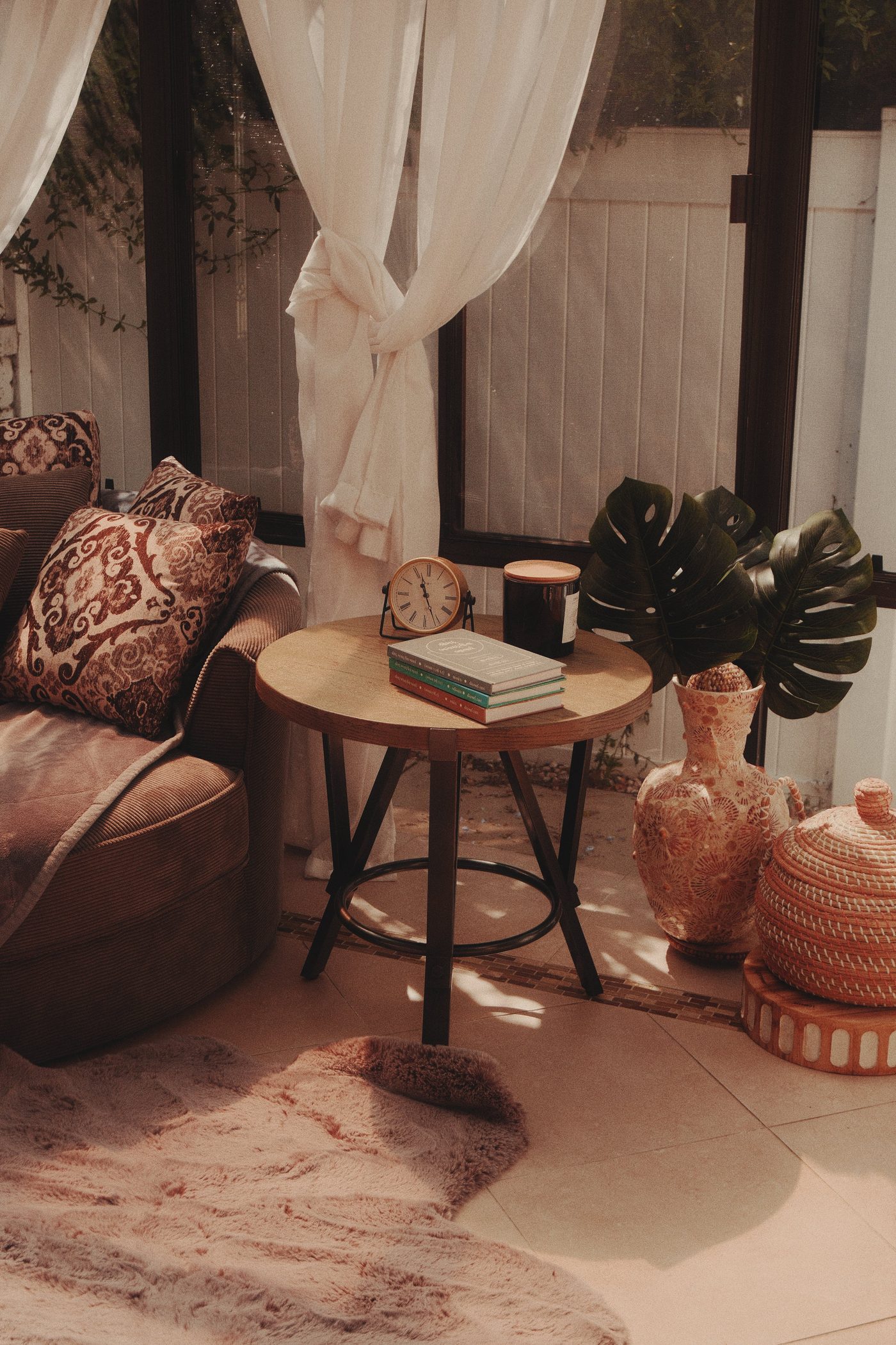 Warm furnished living room with natural light